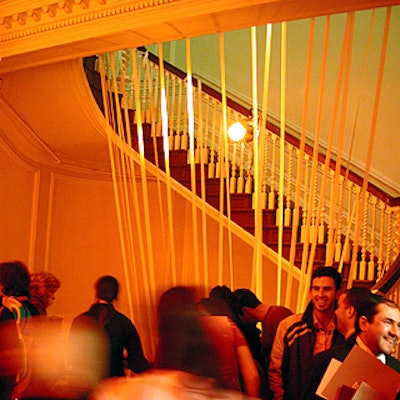 Mariano Airaldi also put fabric strips running from the first floor through the second floor, where the cocktail party took place.