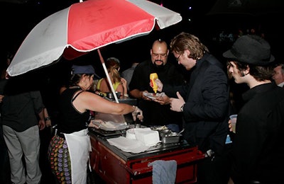 Guests munched on hot dogs served out of a cart stationed on the first floor.