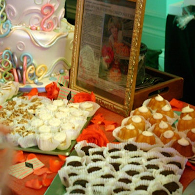 We Take The Cake decorated their table with examples of three-tiered wedding cakes and mini key lime Bundt cakes.