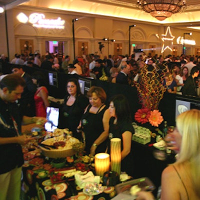 Hundreds of eventgoers crowded into the ballroom at the Ritz-Carlton to raise money for childhood hunger.