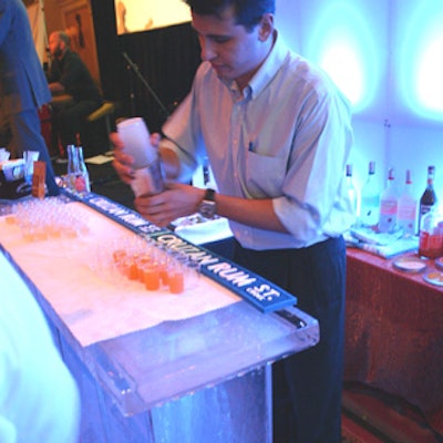 Liquor sponsor Cruzan International offered cocktails and samples from a stylish Lucite bar designed by So Cool Events.