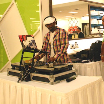 Miami Heat entertainer DJ Irie held court at the turntables to ensure the music fit the party's South Beach vibe.