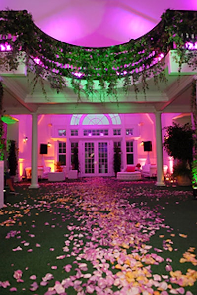 The Estate's foyer was hued purple to emphasize Love Spell, the most popular of the four fragrances.