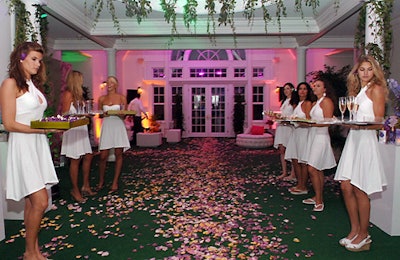 Cocktail waitresses offered drinks, appetizers, and flowers for accessorizing hair and outfits.