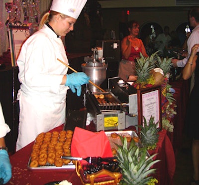 The American Culinary Federation served tropical beignets,made fresh at the table and topped with pineapple and a rum glaze.