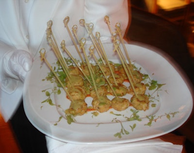 Caterwaiters served bite-size crab cakes during the cocktail reception.