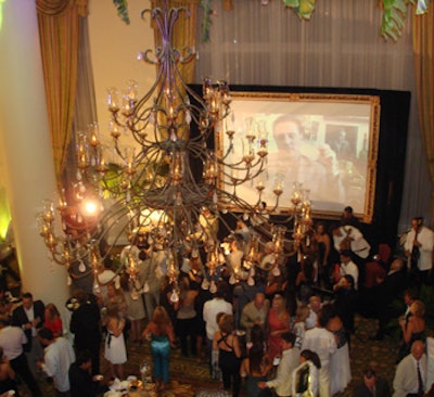 Guests watched clips from the making of The Lost City on a big screen behind the band.