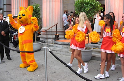 The Meow Mix mascot danced with cheerleaders outside the venue.
