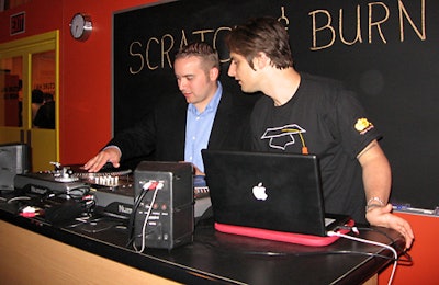 A Monday night guest got a lesson in scratching from a Scratch Academy DJ.