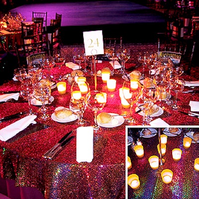 Carolyn Buckley, a designer for the Catering Company, chose these shimmering, iridescent tablecloths from ASAP Linens to adorn the dinner tables. The candles at the center of the table (inset) provided warm, glowing light for the guests during the performances.