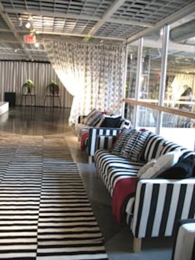 Op art-inspired couches, pillows, and carpets decorated the foyer.