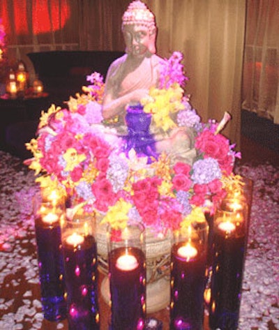 The Event Firm created an Indian paradise with floating candles, Indian statues, and flowers galore.