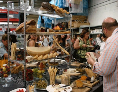 Guests enjoyed sampling the wide selection of cheeses provided as part of the global cheese display in the main event warehouse.