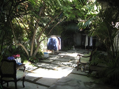 Men's clothes were on display in the home's shaded front yard.