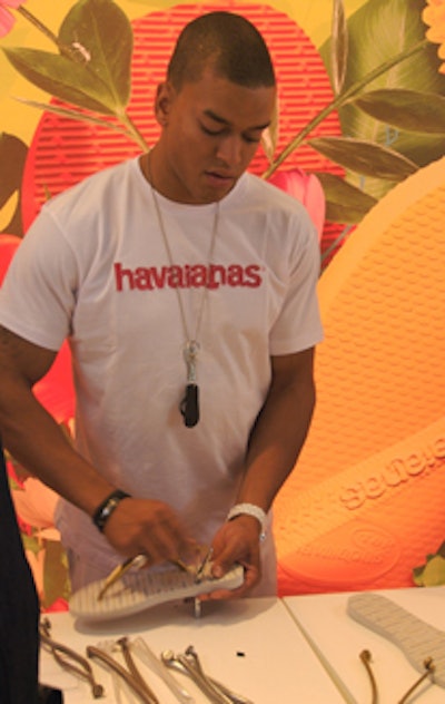 The customized sandals took only a few minutes to make, during which guests mingled with the model staff.