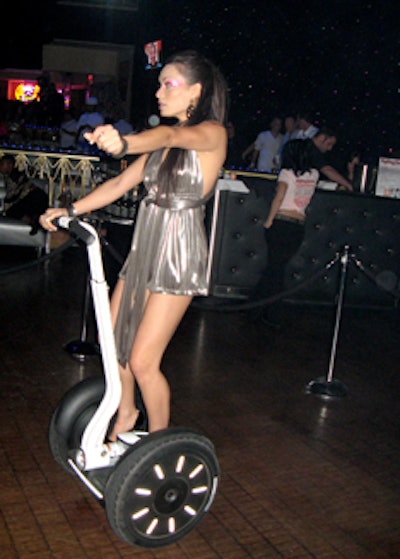 Silver-clad girls on Segways scooted around the dance floor at the Hard Rock's Joint for Rolling Stone's Saturday-night party featuring Kanye West.