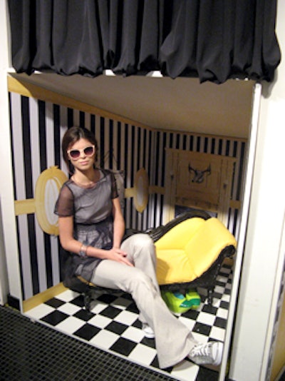 Even the fitting rooms became Alice in Wonderland-themed sets for more model displays.