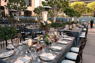 Gold and gray damask cloths topped tables.