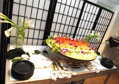 Hors d'oeuvres provided by Eggwhites were displayed on Room Service's new high-top tables.