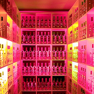 The venue's old vault became a fully-stocked vault of flavored vodka that was backlit by an array of green, pink and orange neon lights.