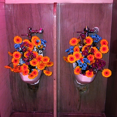 One of the twists of Smirnoff's Twistotica event was that the men's and women's rest rooms were switched, so EventQuest put flowers in the urinals of the new women's rest room.