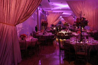 The Kennedy Center's sweeping lilac curtains set the tone for the regal-hued color scheme.