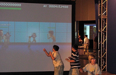 Groups of children practiced their best fight moves with Animaatiokone Industries' Kick Ass Kung-Fu game.