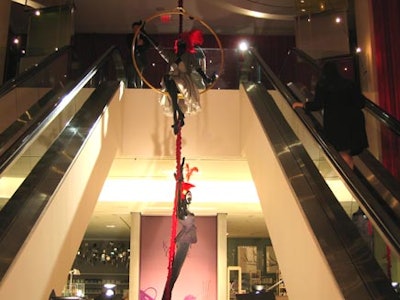 Designer Nicholas Pinney suspended nude aerialist mannequins on ropes hung from the ceiling at Holt Renfrew’s Bloor Street store for the launch of Sienna and Savannah Miller’s Twenty8Twelve label in Canada.