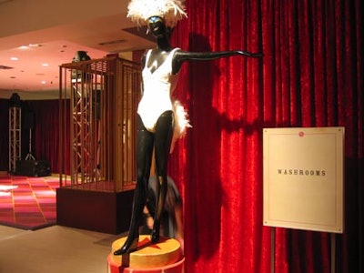Painted mannequins in Victorian garb directed partiers to the bathroom facilities.