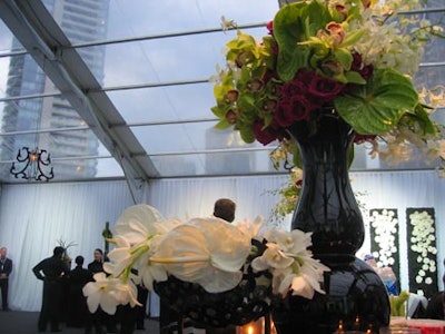 Floral arrangements from Furnishings by Corey added warmth to the ritzy presentation Centre and outdoor tent, while indirect lighting by Westbury National Show Systems provided a soft background glow.