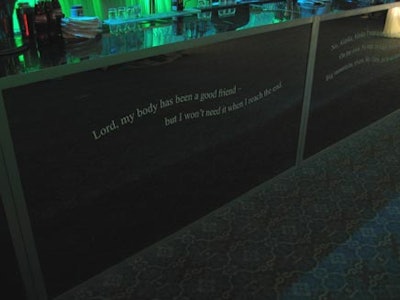 Lyrics from the Cat Stevens song “Miles from Nowhere” appeared on a dark onyx bar, supporting the film’s civilization-left-behind theme.