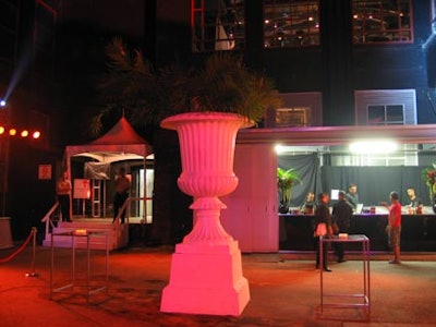 3 Design added traditional notes to this very contemporary event with old fashioned planters.