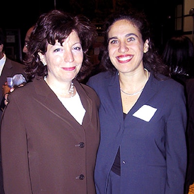 Ruth Cohen, president of Public Education Needs Civic Involvement in Learning (PENCIL), and Suzanne Immerman, director of PENCIL's Principal for a Day program, at the group's town hall-style meeting.