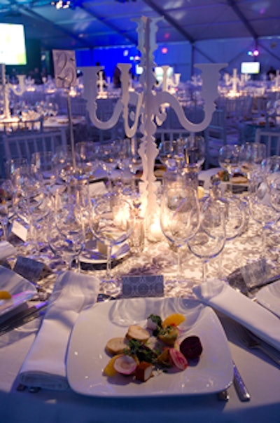 Colorful appetizers, playing off the elaborate white and crystal table settings, awaited guests as they took their seats.