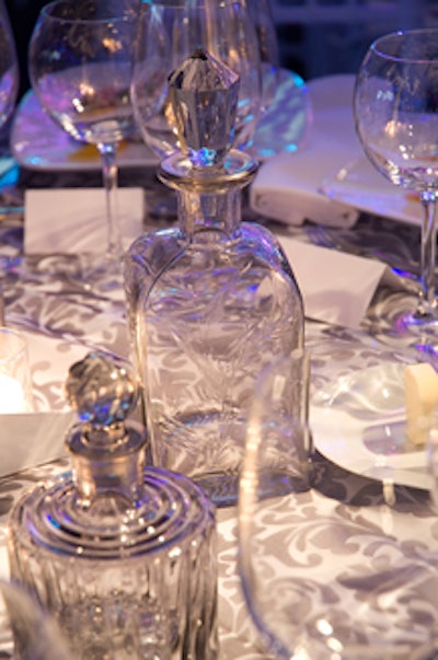 Decanters served as part of the table decor. Brocade Home's designers mixed their accessories with rental tableware.