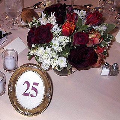 The tables also had small oval frames (from the Metropolitan Club) showing the table numbers.