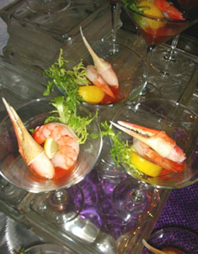 Jumbo shrimp cocktail and crab claws were presented in martini glasses at the seafood station.