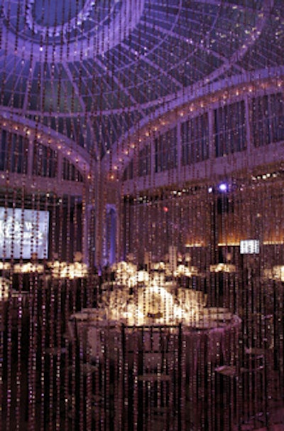 Cascading metallic beads separated the cocktail hour from the dinner and played into the night's platinum theme.