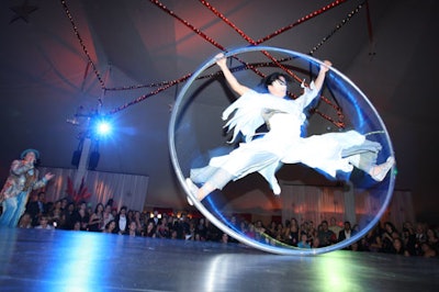 Cirque du Soleil performers entertained guests in the party tent.