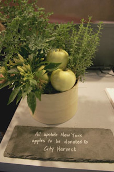 Local apples, bamboo planters, and herb topiaries all played into the environmentally conscious theme. The apples, which were also used as centerpieces for one of the dinners, were later donated to City Harvest.