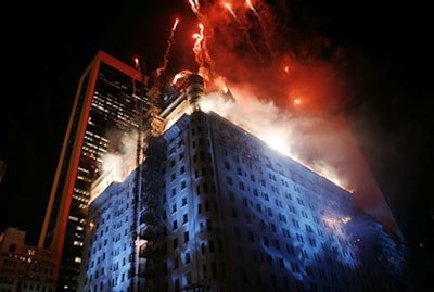 Before the cake was cut, Fireworks by Grucci turned the landmark into a birthday cake of sorts, shooting pyrotechnics from the roof (simulating candles) as well as out of the building's windows.