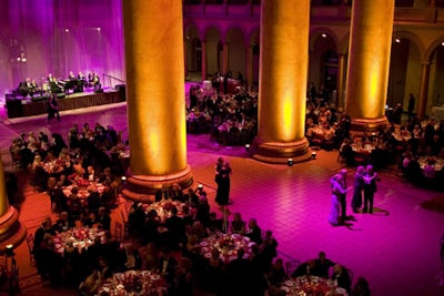 Guests danced till after midnight on adjacent dance floors beneath the National Building Museum's 75-foot Corinthian columns awash in golden light.