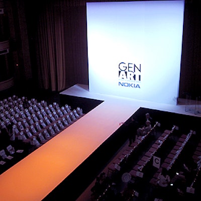 The stark white stage by Bernhard-Link Theatrical Productions also served as a projection screen during the fashion awards show.