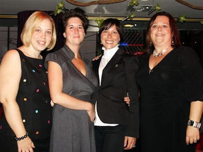 Newly appointed BizBash Toronto publisher Sabina Pirri, far right, and new vice-president of events Robyn Small, second from left, posed for pictures at the Drake Hotel during a cocktail party celebrating their promotions.