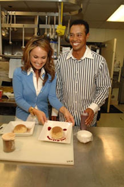 Tiger Woods piddled in the kitchen at the tasting event, which featured a three-course meal overseen by Giada de Laurentiis.