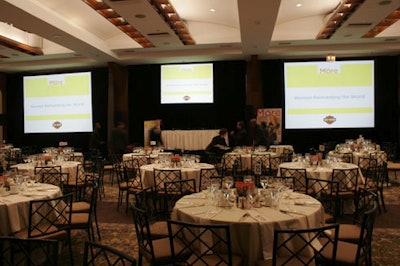 Flowers for the lunch, sponsored by Harley Davidson, echoed the motorcycle brand's colors.