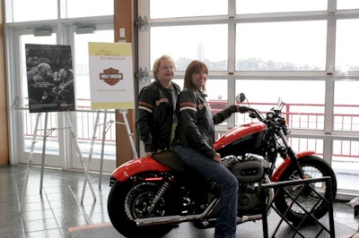 Attendees could pose for a photo on a Harley Davidson.