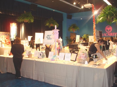 The silent auction in Hernando's Hideaway had a variety of items up for bid, including autographed sports memorabilia, spa treatments, shopping sprees, and jewelry.