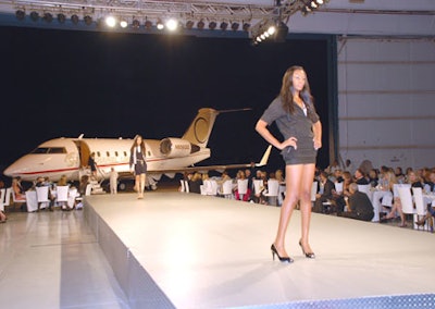 Models stepped off a plane and directly onto the runway for the fashion show.
