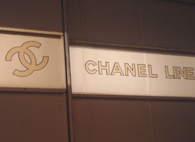 The Chanel logo was projected onto the door of the hangar.
